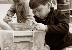 Students share Legos and other toys