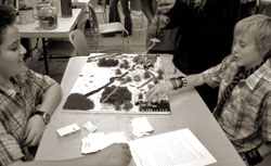 Students explore the novel through a board game one of their classmates created
