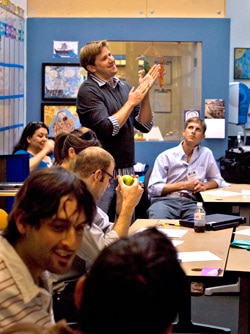 A teacher giving a standing ovation