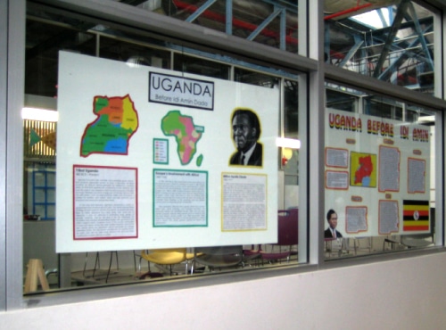 A poster board project on Uganda hanging from a wall