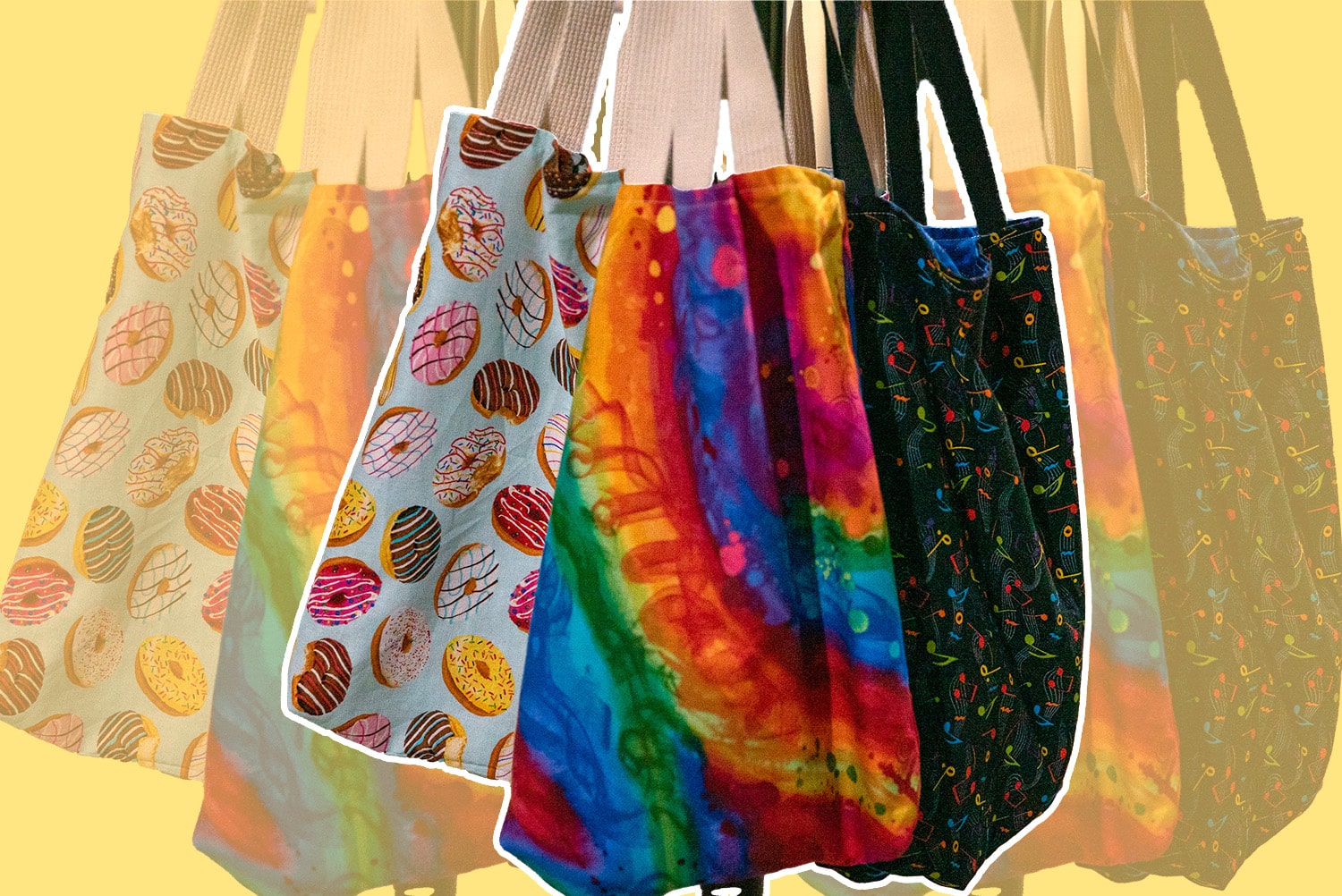 Three of the completed totes, each with a different fabric print
