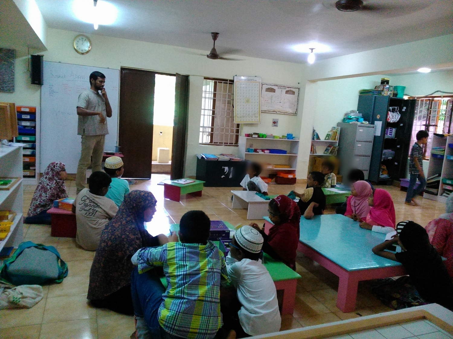 Students in a classroom with a teacher