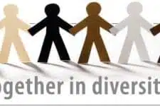 Illustration of paper doll cutouts holding hands in various skin tones. Below, the text reads together in diversity, emphasizing unity and inclusivity. Download this heartwarming image today to celebrate our collective strength through diversity.