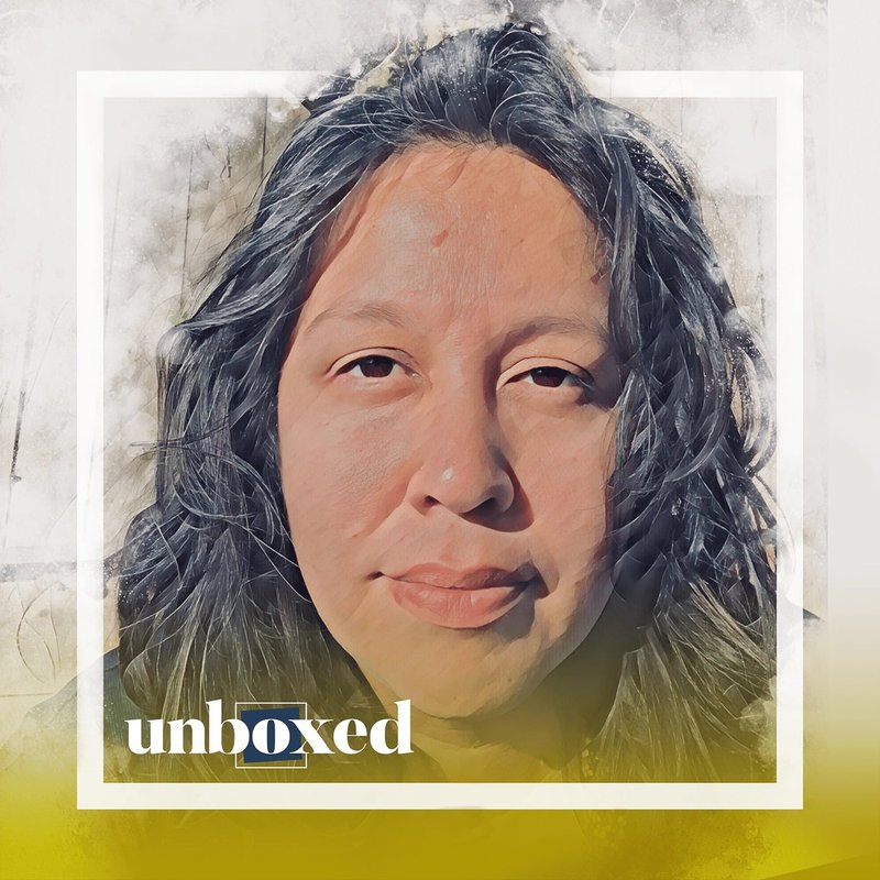 Digital artwork by Eva Mejia features a person with long, wavy hair and a neutral expression, wrapped in a soft color palette. The image is framed with the word unboxed in the bottom-left corner, partially highlighted in yellow.