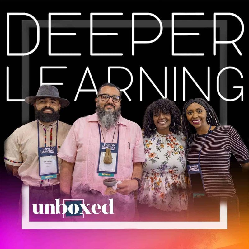 Four people are smiling in front of a Deeper Learning banner, embodying stories of collaboration. Two men and two women, all wearing name tags, stand together proudly. The image features a gradient border with the word unboxed at the bottom.