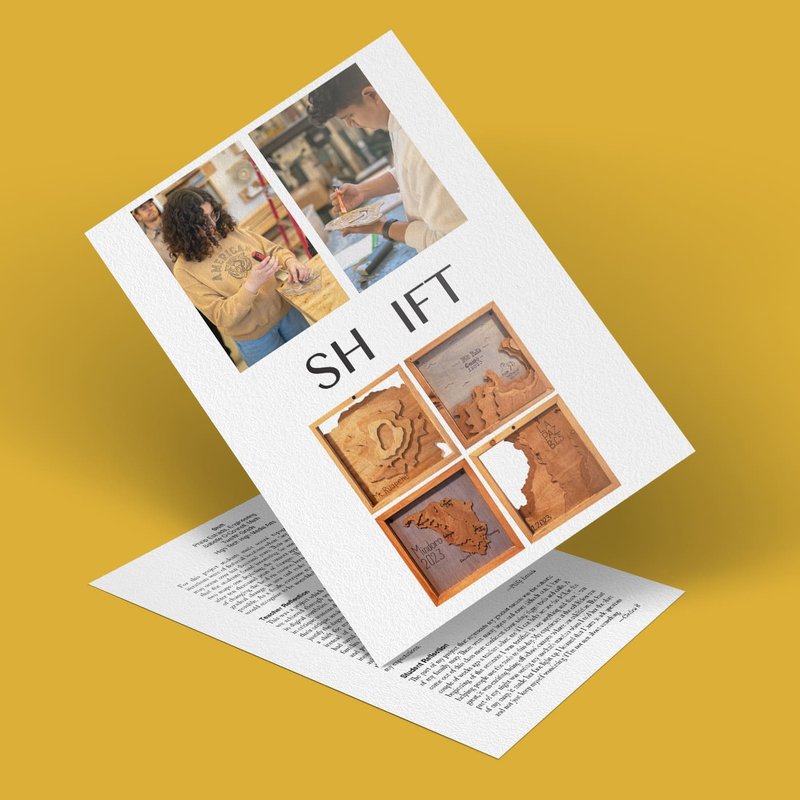 A magazine spread features images of people crafting wooden art and maps. The text SHIFT is in the center, with photos of engraved wooden designs below. The background is a solid mustard yellow.