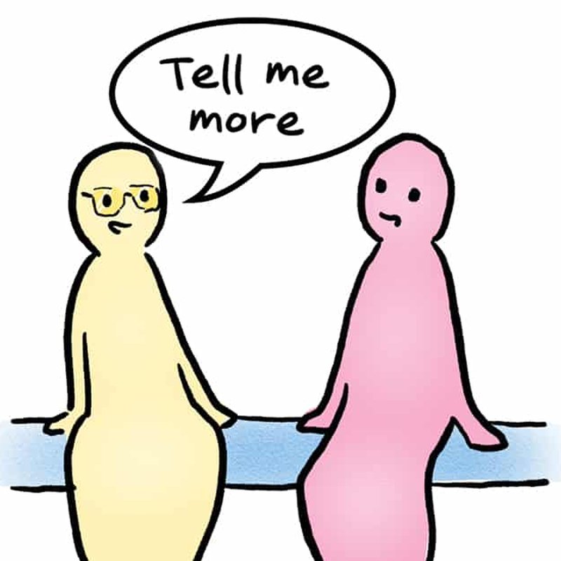 Two simple cartoon characters sit on a bench facing each other. The character on the left, wearing glasses, has a speech bubble saying, Tell me more. Demonstrating empathy, the character on the right listens with a neutral expression.