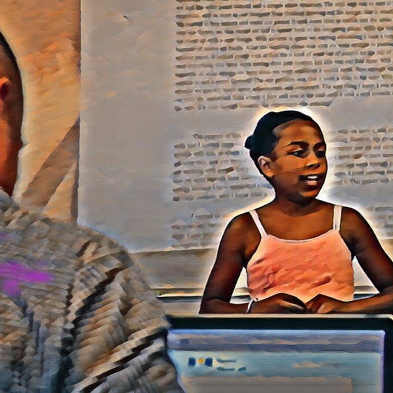 A young girl in a pink tank top discusses self-assessment while standing in a classroom. The background features large, blurred text, and a person in the foreground is partially visible, wearing a patterned shirt. The image has a painting-like filter effect.