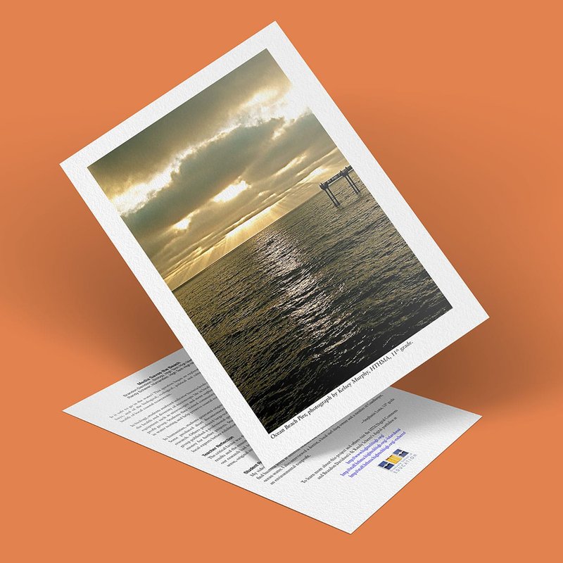 A greeting card captures a stunning beach sunset, with rays of sunlight piercing through the clouds over the ocean. Set against an orange background, the card adds warmth and beauty. Text graces the inside, making it a perfect keepsake for those cherished moments.