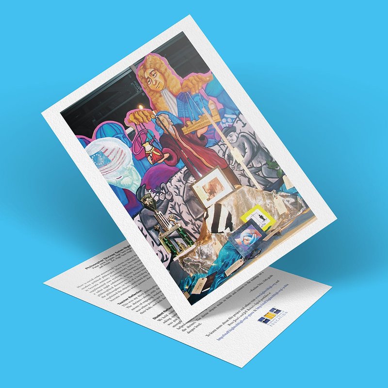 A colorful mural features a robed philosopher holding scales, surrounded by various objects and abstract designs. The image is displayed against a bright blue background, with text partially visible beneath.
