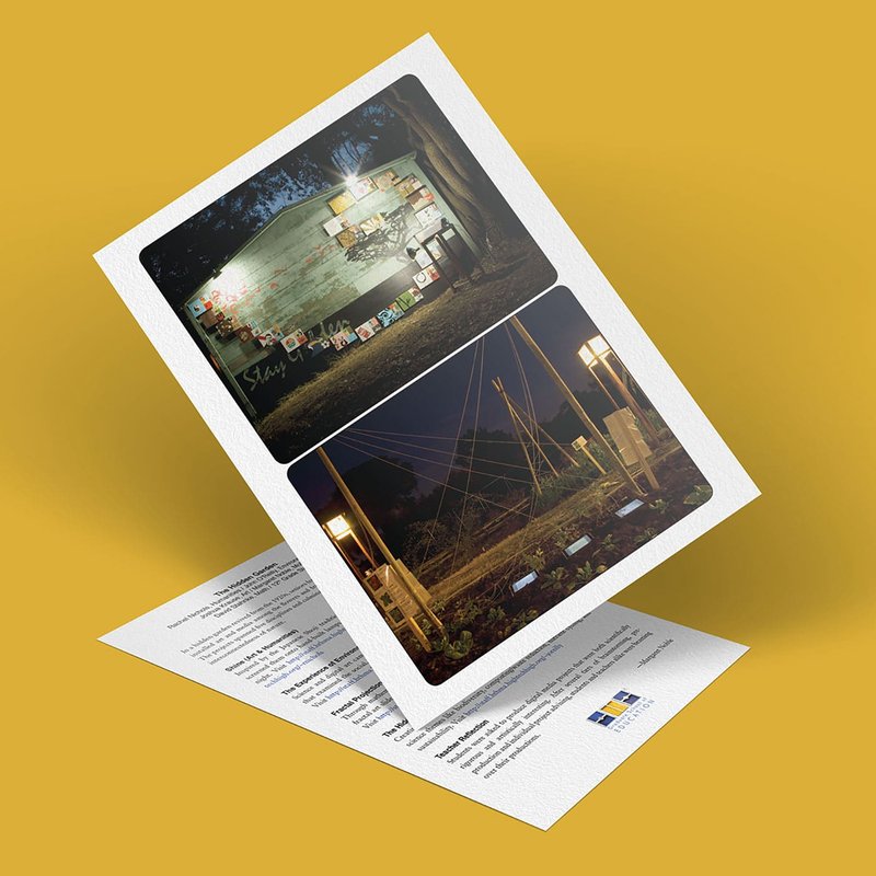 A tilted card showcasing two photographs: the top highlights a brightly lit wall cloaked in papers, reminiscent of a hidden garden at night. The bottom captures an illuminated outdoor installation with wires and poles. The card is set on a flat paper with text.