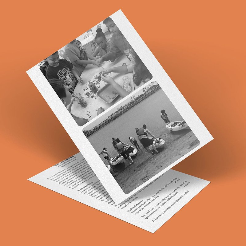 A greeting card on an orange surface showcases black and white photos. The top photo, oozing with the joy of traditions, depicts people sitting around a table playing a game. The bottom photo reveals wise kids standing on a beach with kayaks, ready for adventure.