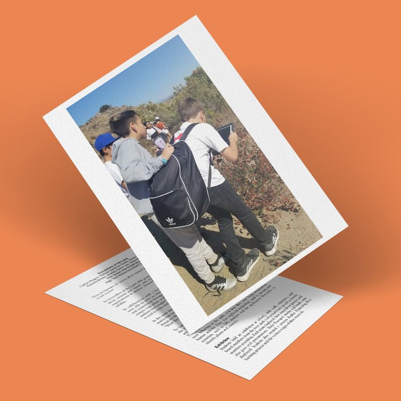 A photo of two young men, modern-day storytellers, standing outdoors; one carries a backpack while the other uses a smartphone. They appear on a hiking trail. The image is set against a textured orange background with partially visible text underneath.