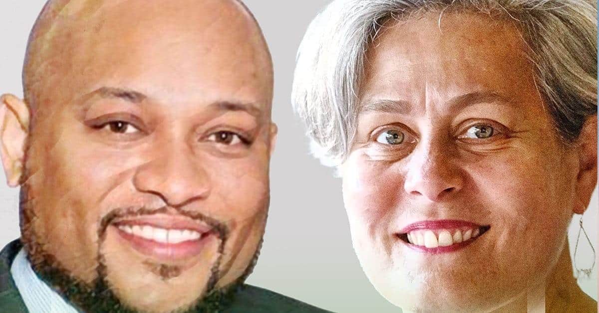 A man and a woman smiling at the camera, exuding warmth and confidence. The man has a beard and is wearing a suit, while the woman sports short hair with gray highlights. They appear to be in a friendly setting, possibly discussing strategies for college success against a neutral backdrop.