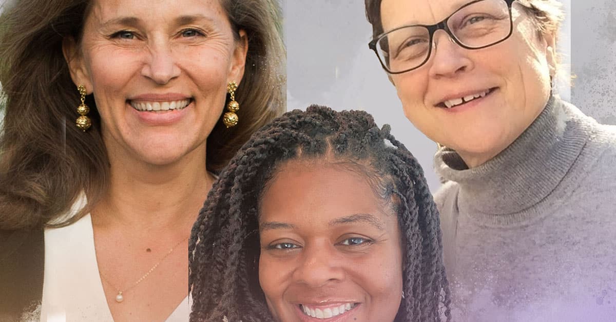 Three people smiling, standing closely together like a team of inventors showcasing their latest creation. The first person has long brown hair and gold earrings, the second person sports braided hair, and the third wears glasses with a gray turtleneck against a light, misty gradient background.