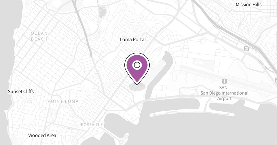 A grayscale map highlights the Loma Portal area of San Diego, California, with a large purple location pin marking a central spot. Deeper Learning 2026 and education landmarks like Sunset Cliffs and San Diego International Airport are visible nearby.