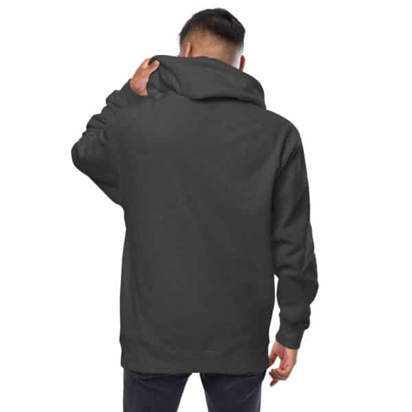 A person wearing a dark gray unisex hoodie is facing away from the camera, holding the hood with one hand. The background is plain and white.