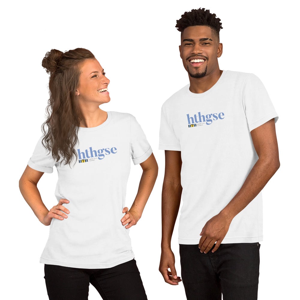 A woman and a man stand side by side, smiling in matching unisex T-shirts with "hthgse IFTR" printed in full color blue and yellow text. The background is plain white.