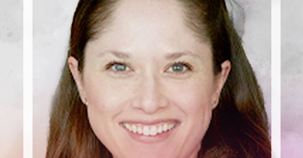 A woman with long brown hair smiles at the camera. She has light skin, blue eyes, and is wearing subtle makeup. The softly blurred background in neutral tones evokes a calm space to transform schools beyond bureaucracy. A white frame borders the image.